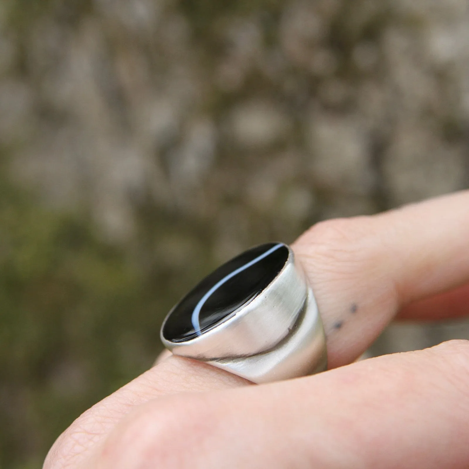 Large Oval Flat Cut Banded Black Onyx Ring