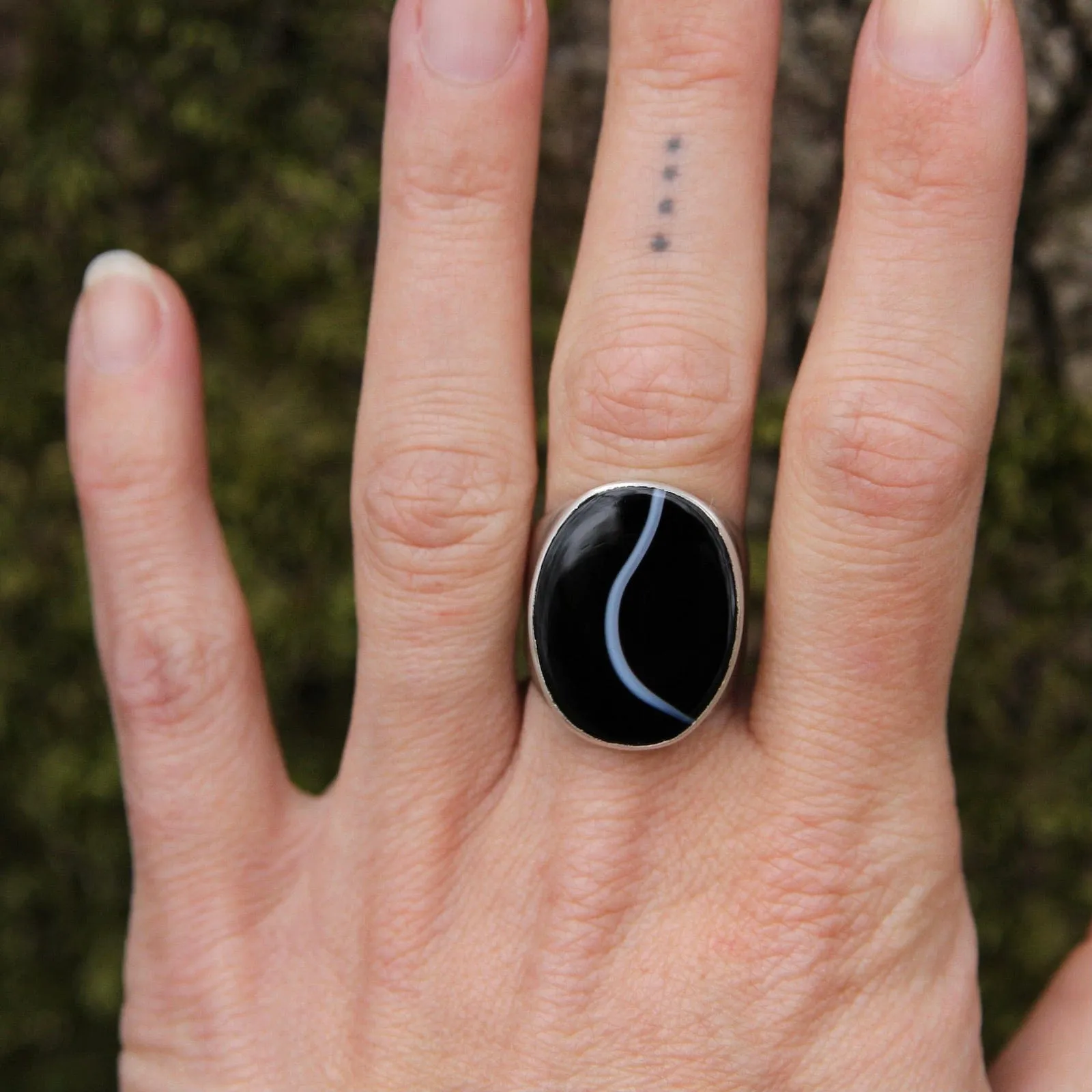 Large Oval Flat Cut Banded Black Onyx Ring