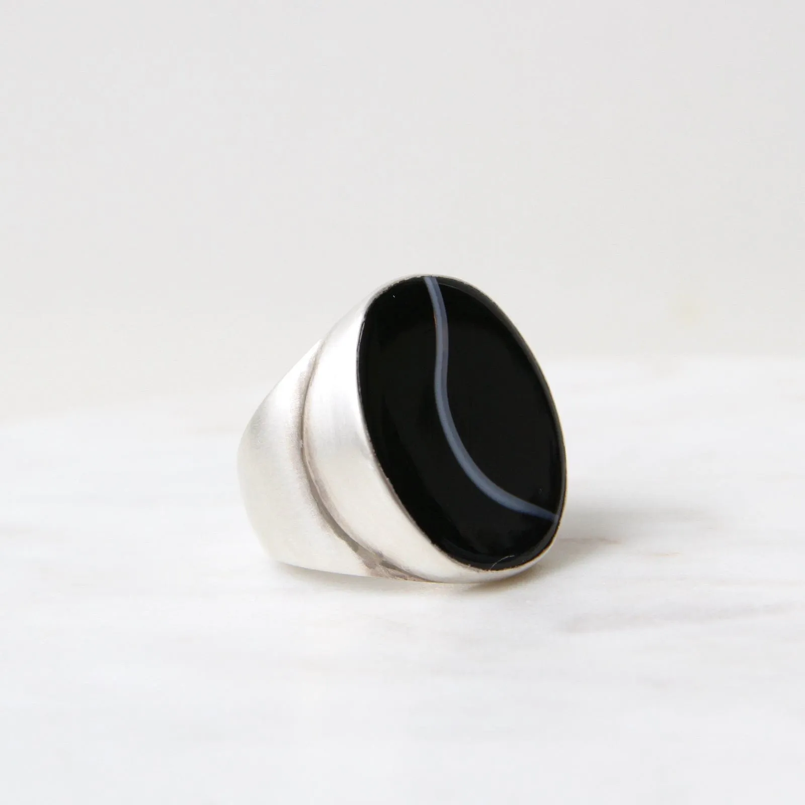 Large Oval Flat Cut Banded Black Onyx Ring