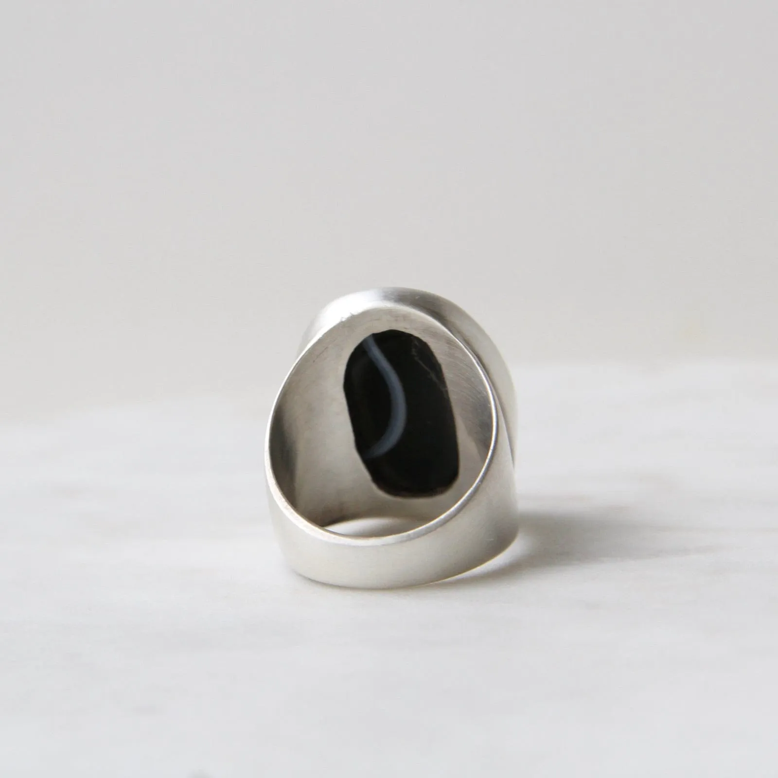 Large Oval Flat Cut Banded Black Onyx Ring