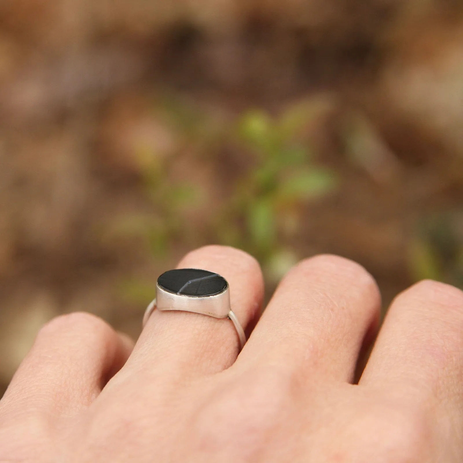 Oval Flat Cut Banded Black Onyx in Sterling Silver Ring