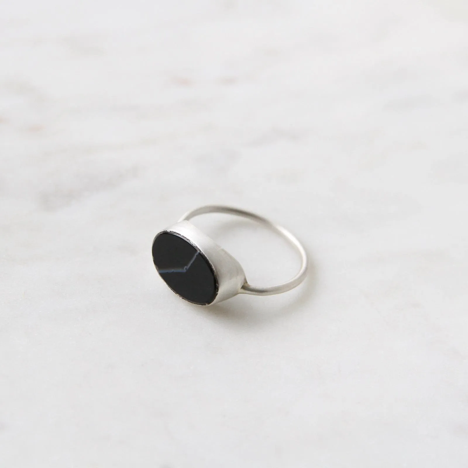 Oval Flat Cut Banded Black Onyx in Sterling Silver Ring